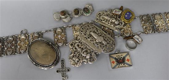 An embossed white metal belt and an Indian white metal buckle and other assorted items including a Russian pendant.